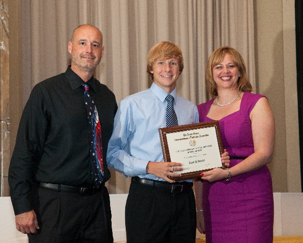 In May, Dr. Robert Young (l), cybersecurity and information technology specialist, Defense Information Assurance Program, Office of the Secretary of Defense, and Jennifer Kauffman, chapter president, present an award to Karl Schmidt, Mount Hebron High School, recipient of a $10,000 four-year scholarship.